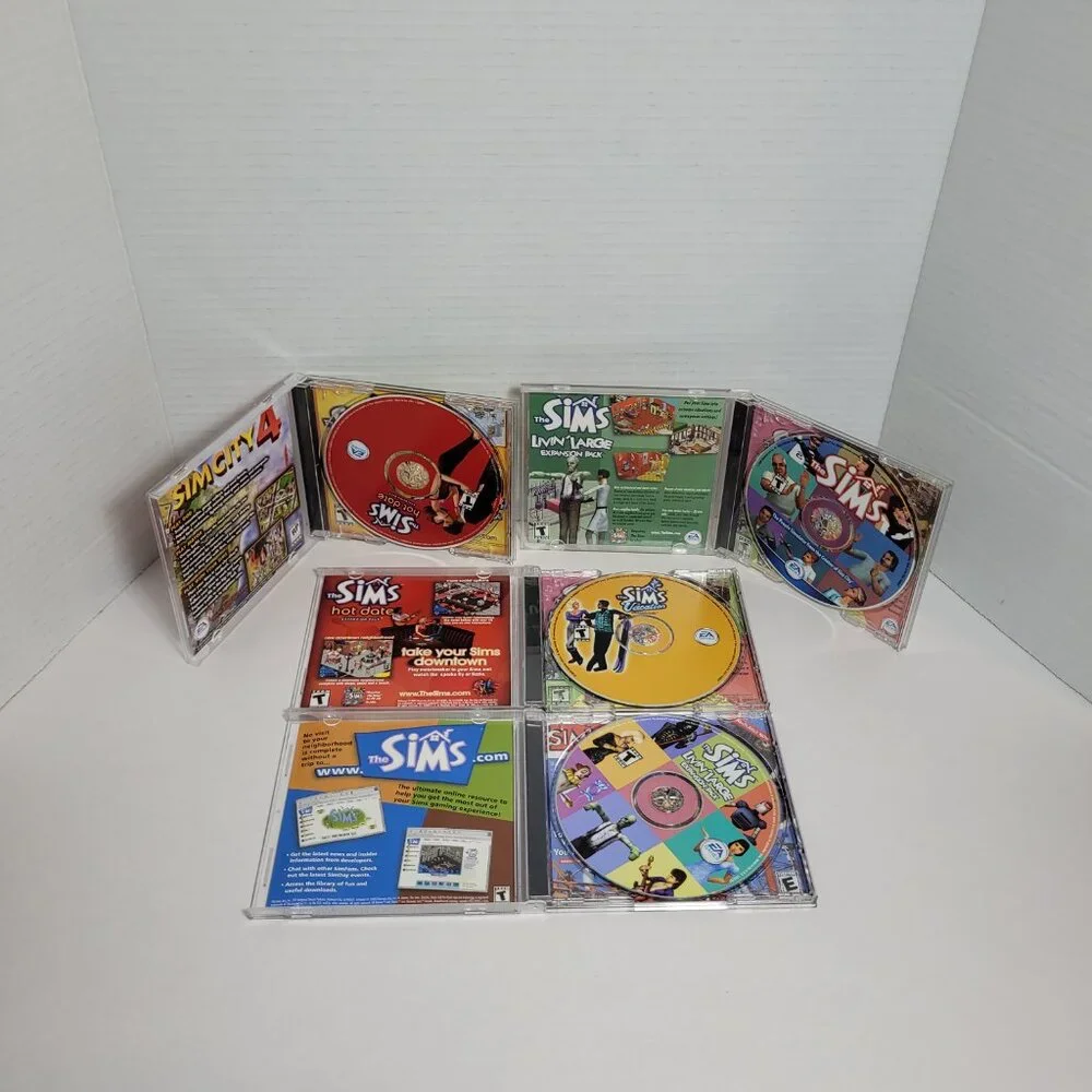 The Sims Lot of 4 PC Cd Hot Date, Vacation, Livin Large, Games